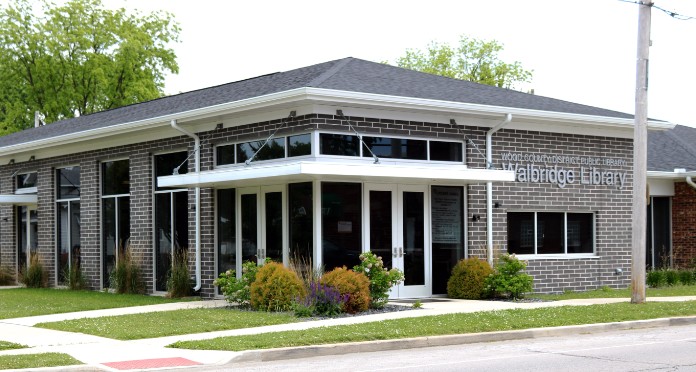 The new Walbridge library, with tall windows and gray brick.