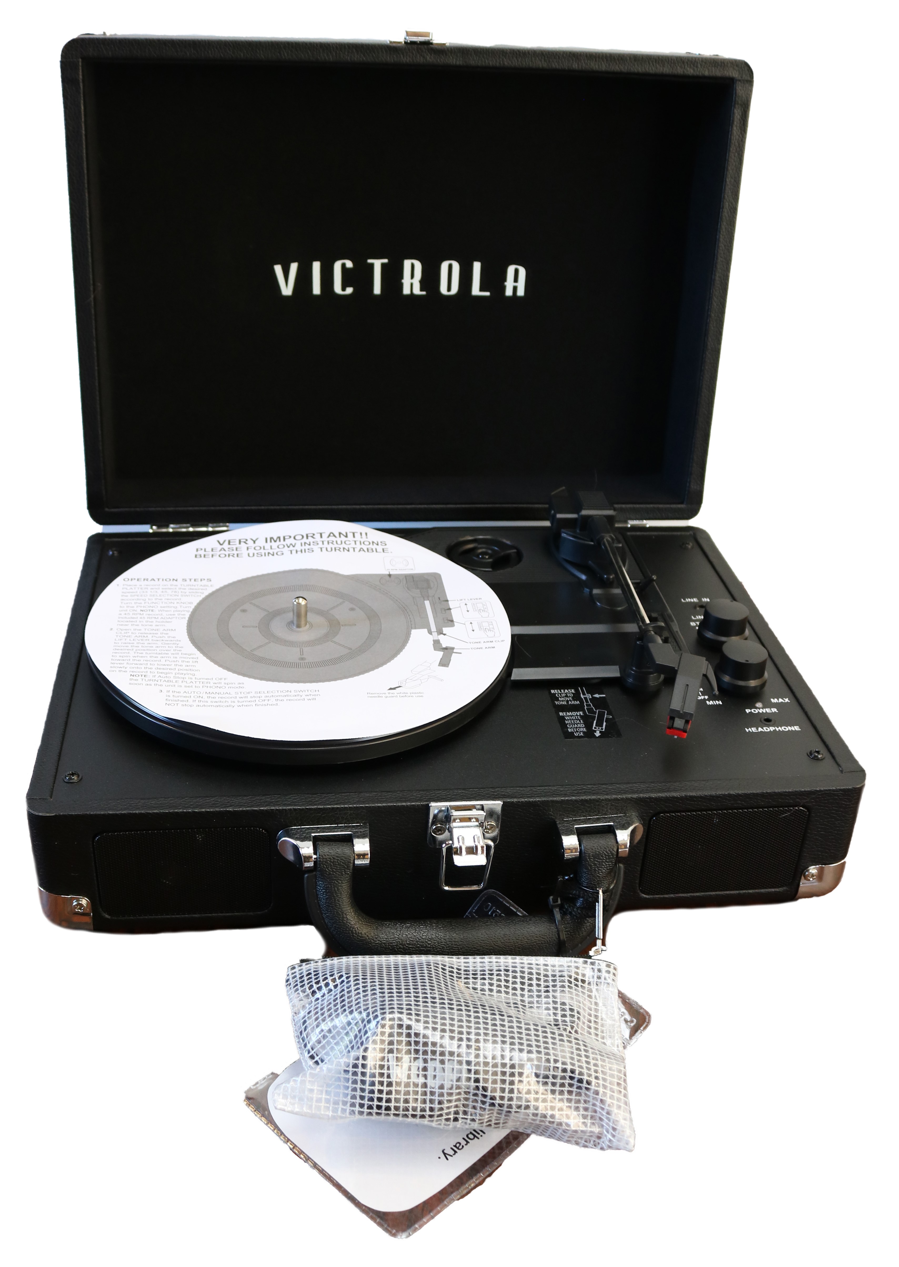 A black turntable and record.