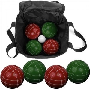 A set of green and red bocce balls.